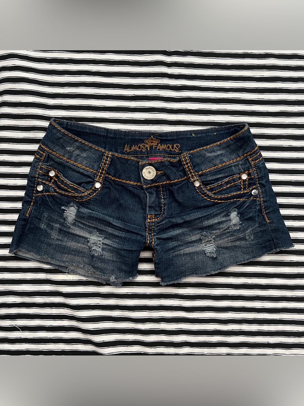 Y2K low rise dark wash shorts with gold stitching - almost famous